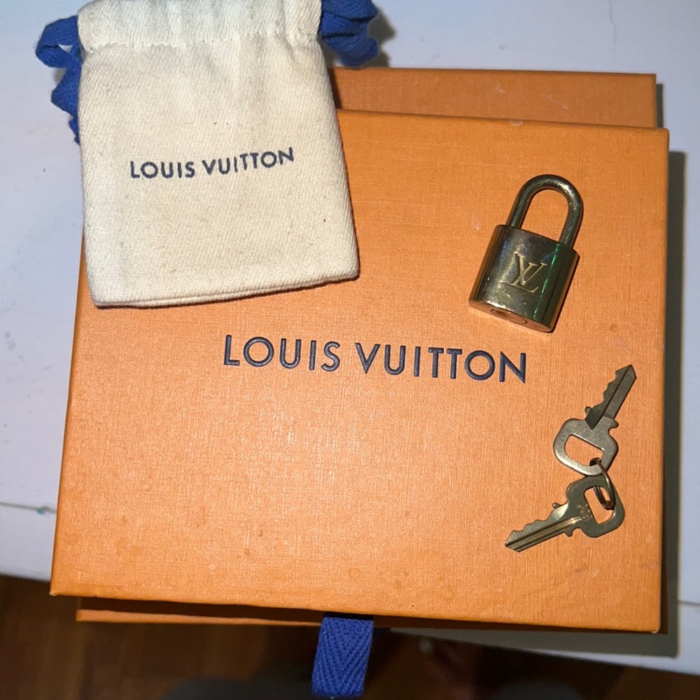 LV Original keys and lock pouch and box.